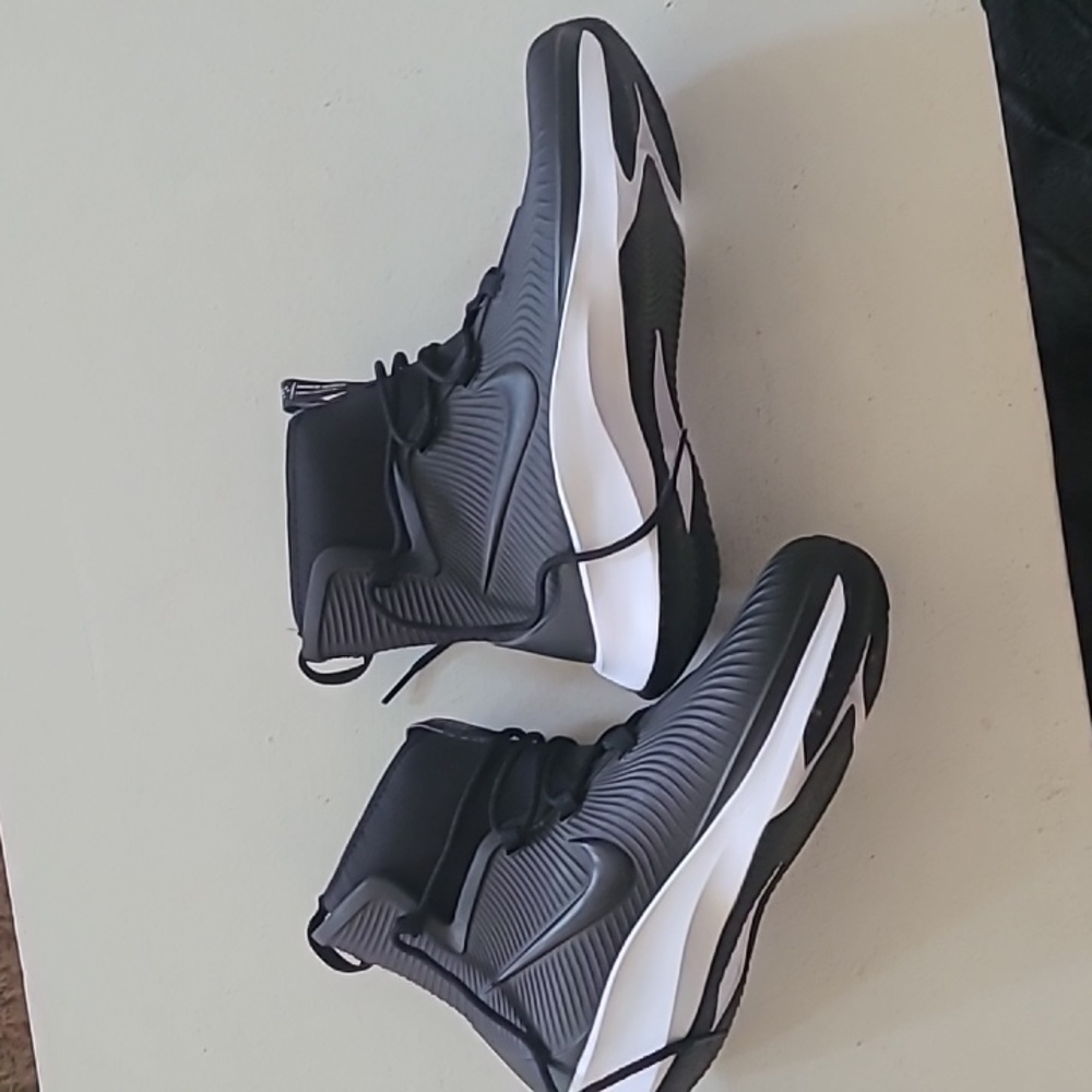 Kids size 5y nike boots! Rubber black with neoprene insert waterproof!